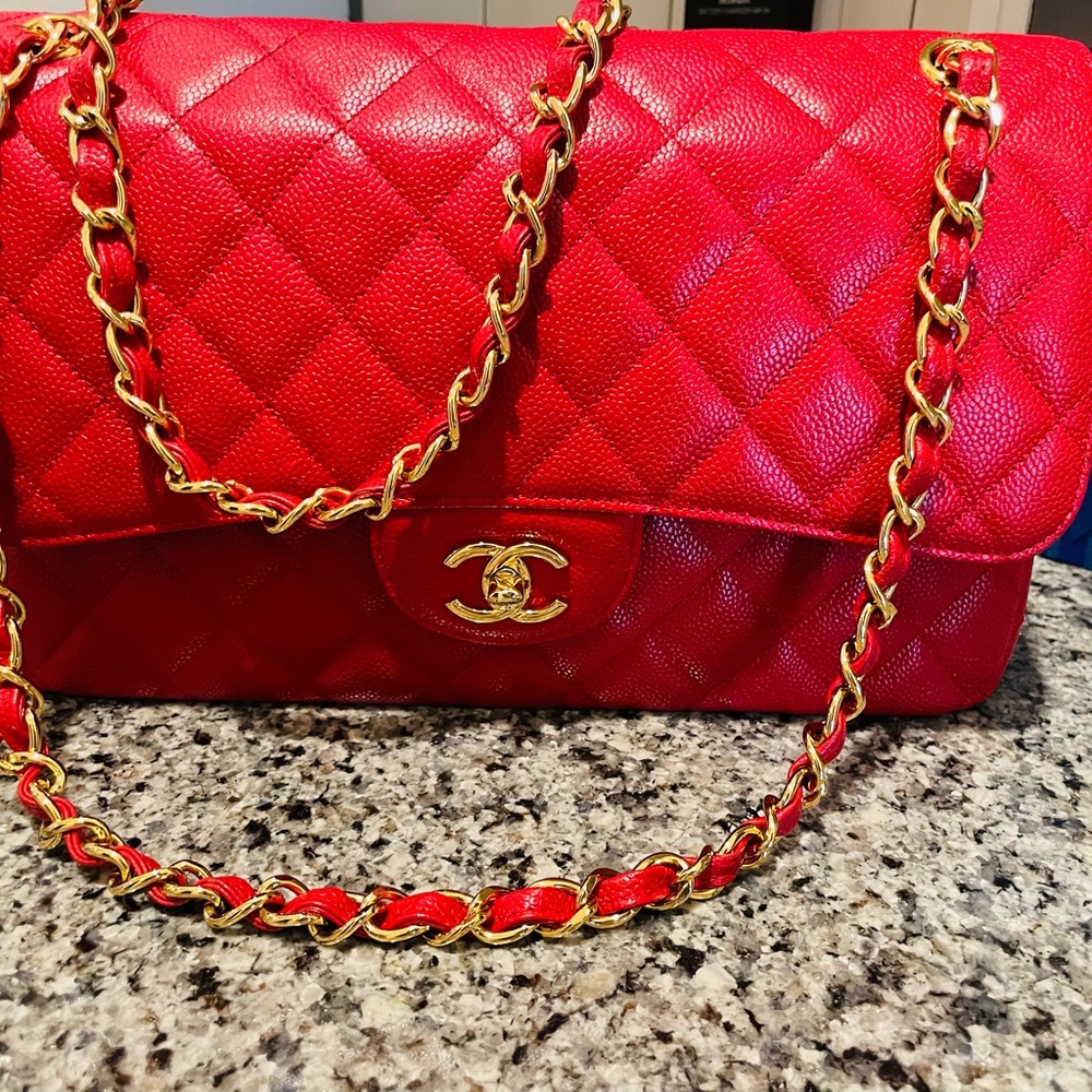 CHANEL JUMBO DOUBLE FLAP RED quilted caviar leather handbag